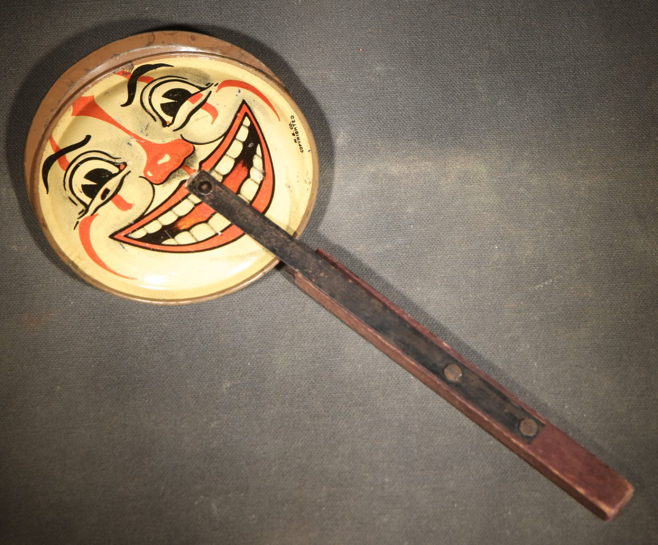 Vintage Tin Lithograph Clapper Noisemaker with Halloween Clown Face Graphics, Manufactured by M.B. Co.