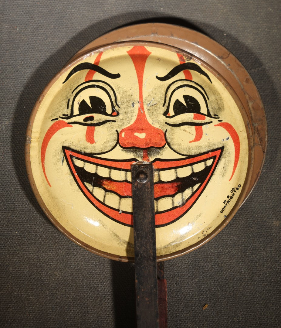 Vintage Tin Lithograph Clapper Noisemaker with Halloween Clown Face Graphics, Manufactured by M.B. Co.