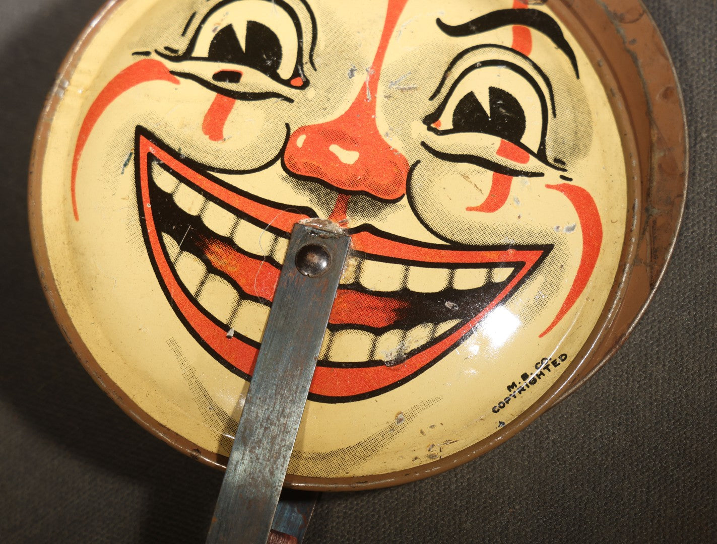 Vintage Tin Lithograph Clapper Noisemaker with Halloween Clown Face Graphics, Manufactured by M.B. Co.