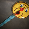 Lot 055 - Vintage Tin Lithograph Clapper Noisemaker with Clown and Jack-O-Lantern Face Graphics, Made in Germany, 8-7/8" L