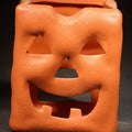 Lot 063 - Modern Terracotta Halloween Jack-O-Lantern Luminary, Michaels Stores 2005, with Puopolo Candles Label, 5" H