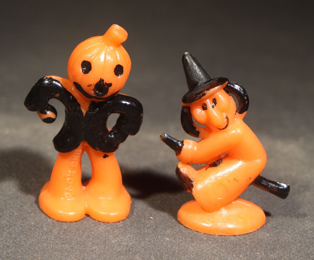 Grouping of Four Vintage Plastic Halloween Cupcake Toppers including Jack-O-Lantern Pumpkin Head Figure and Three Witches on Broomsticks, Hong Kong