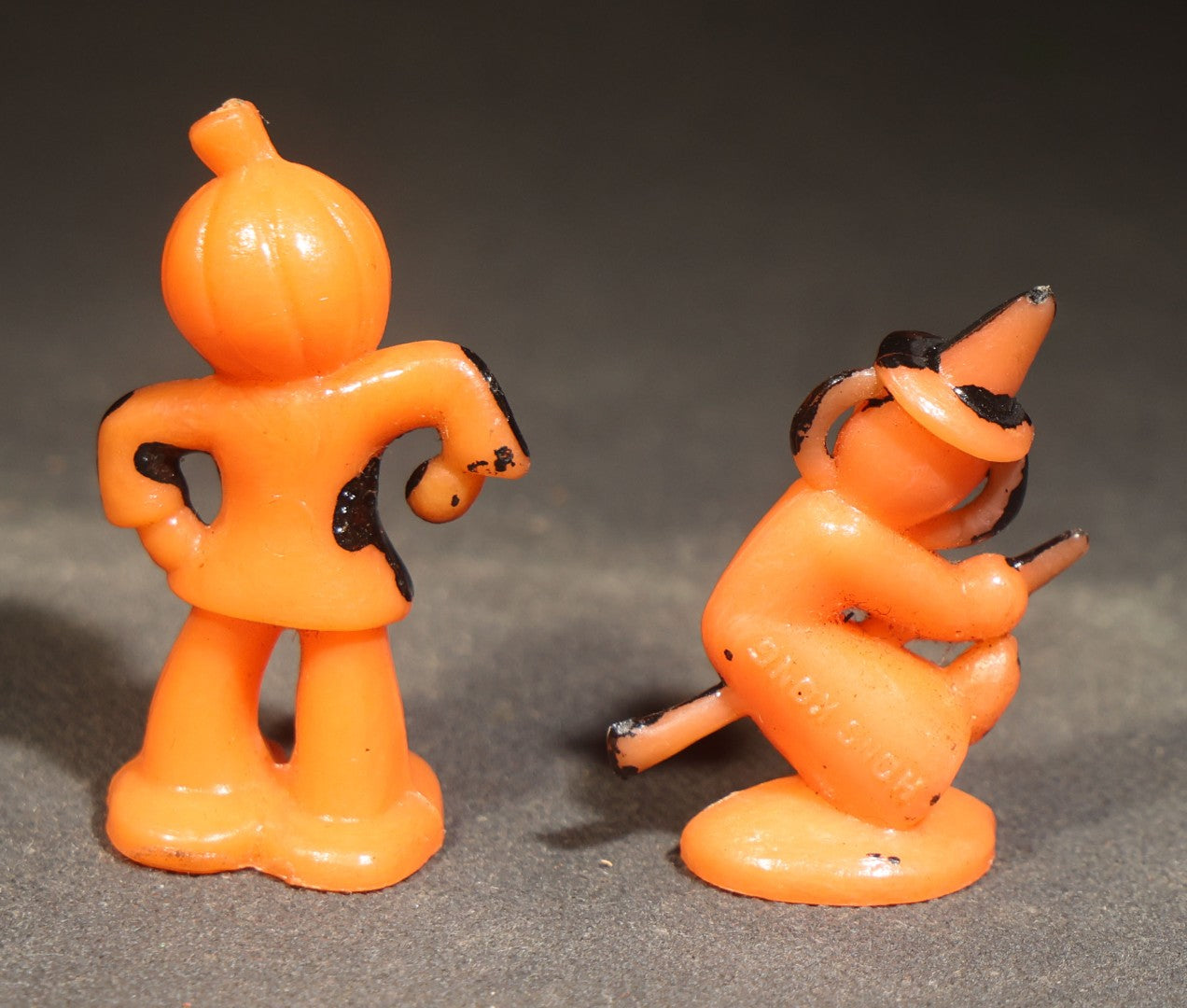 Grouping of Four Vintage Plastic Halloween Cupcake Toppers including Jack-O-Lantern Pumpkin Head Figure and Three Witches on Broomsticks, Hong Kong