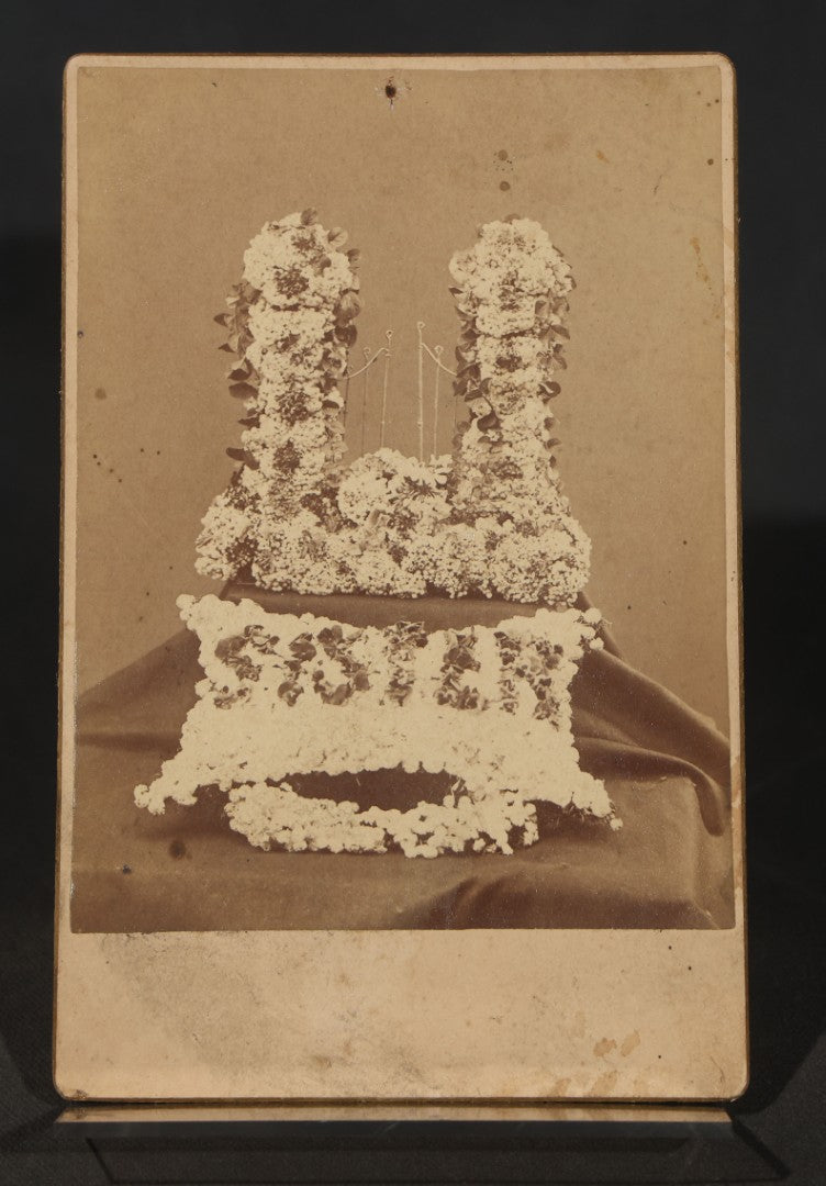 Antique Cabinet Card Photograph of Funerary Floral Arrangements with "Sister" Flower Pillow and Gates of Heaven Display, Inscribed "Flowers at Aunt Lou's Funeral"