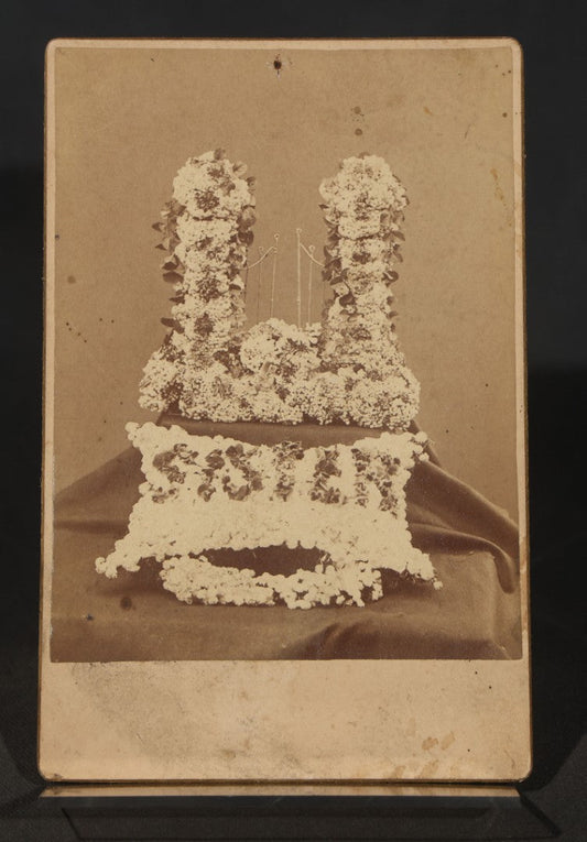 Antique Cabinet Card Photograph of Funerary Floral Arrangements with "Sister" Flower Pillow and Gates of Heaven Display, Inscribed "Flowers at Aunt Lou's Funeral"