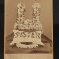 Lot 003 - Antique Cabinet Card Photograph of Funerary Floral Arrangements with "Sister" Flower Pillow and Gates of Heaven Display, Inscribed "Flowers at Aunt Lou's Funeral"