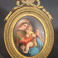 Lot 006 - Antique Miniature Painting on Porcelain After Raphael's "Madonna Della Seggiola," In Gilt Brass Oval Frame with Ribbon Bow Crest, 2-5/8" W x 3-7/8" H