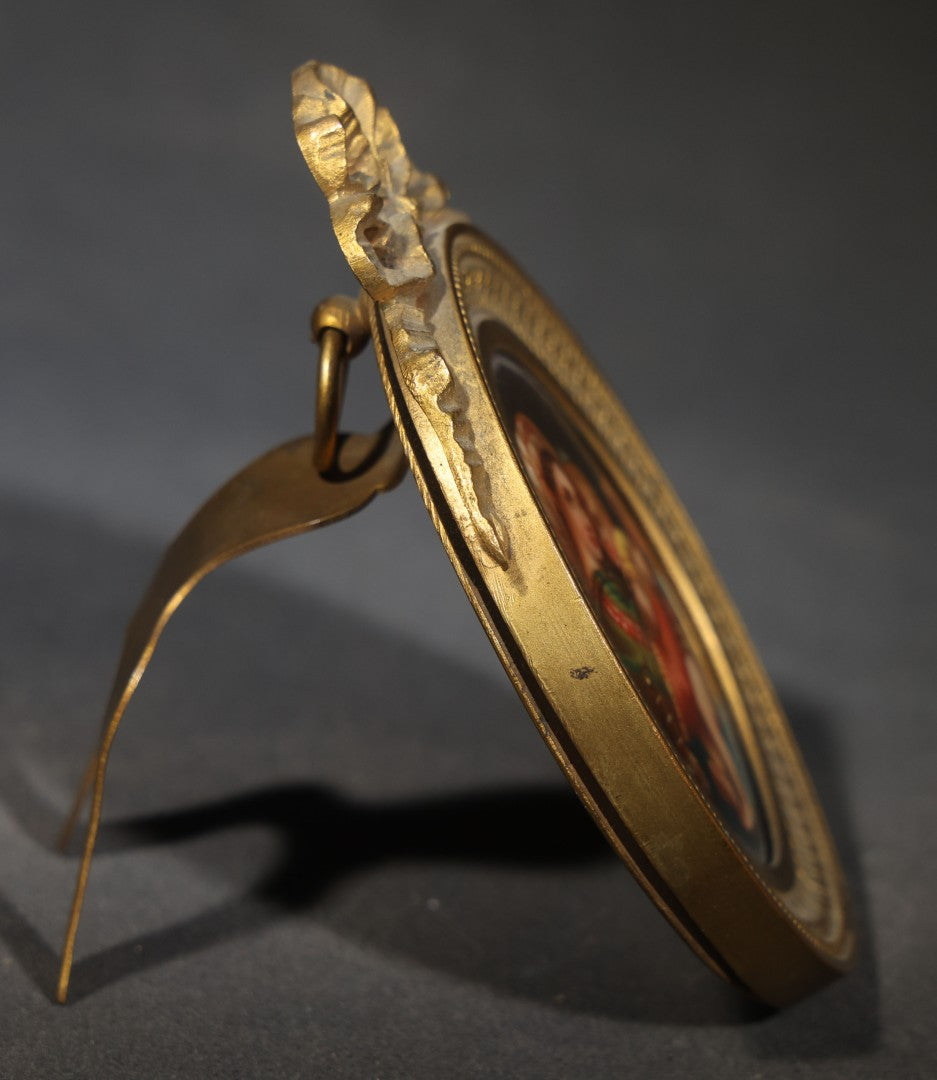 Antique Miniature Painting on Porcelain after Raphael's "Madonna della Seggiola," in Gilt Brass Oval Frame with Ribbon Bow Crest