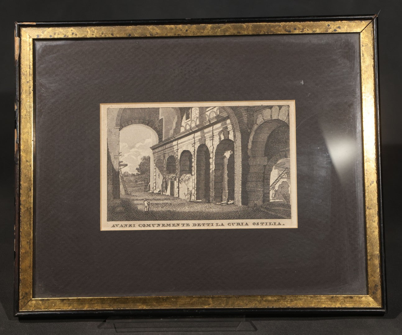 Pair of Antique Engraving Prints of Roman Architecture including "Avanzi Comunemente Detti La Curia Ostilia" ("Remains Commonly Called the Curia Hostilia") and "Temple de Romulus" ("Temple of Romulus") in Modern Frames