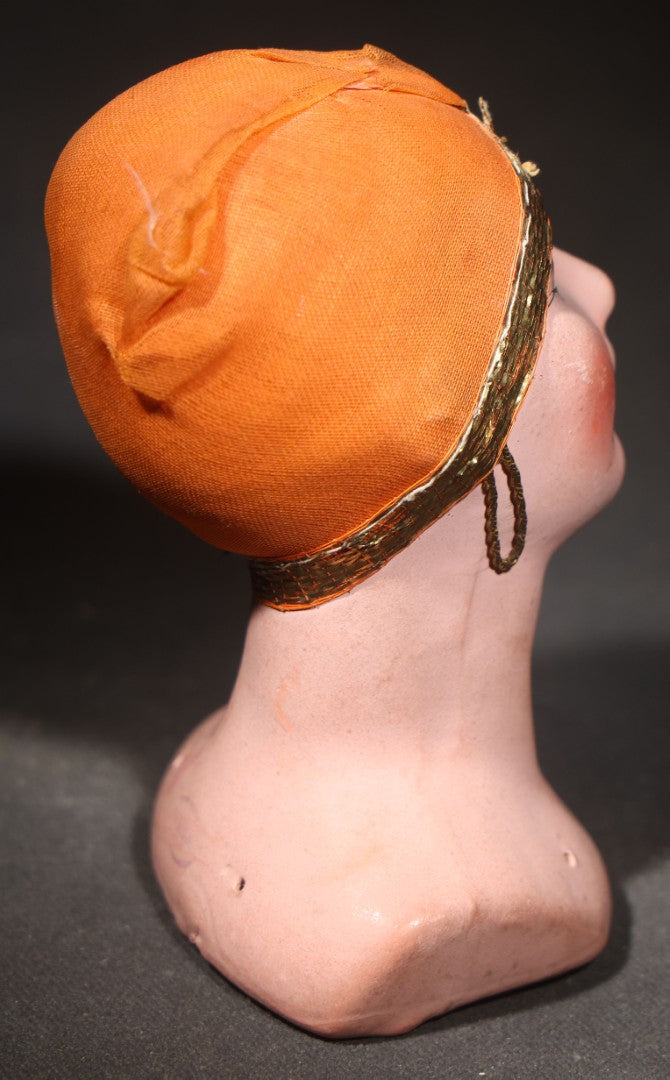 Antique Hand-Painted Half-Doll Bust with Orange Fabric Cap and Gold Metallic Trim