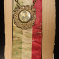 Lot 041 - Antique Italian-American Mutual Aid Society "Vice Presidente" Ribbon Badge, Societa Di M. Soccorso B. Gabriele Del Gransasso, Incorporated 1919, West Philadelphia, Pennsylvania, with Portrait Medallion and Italian Tricolor Ribbon, 8" H