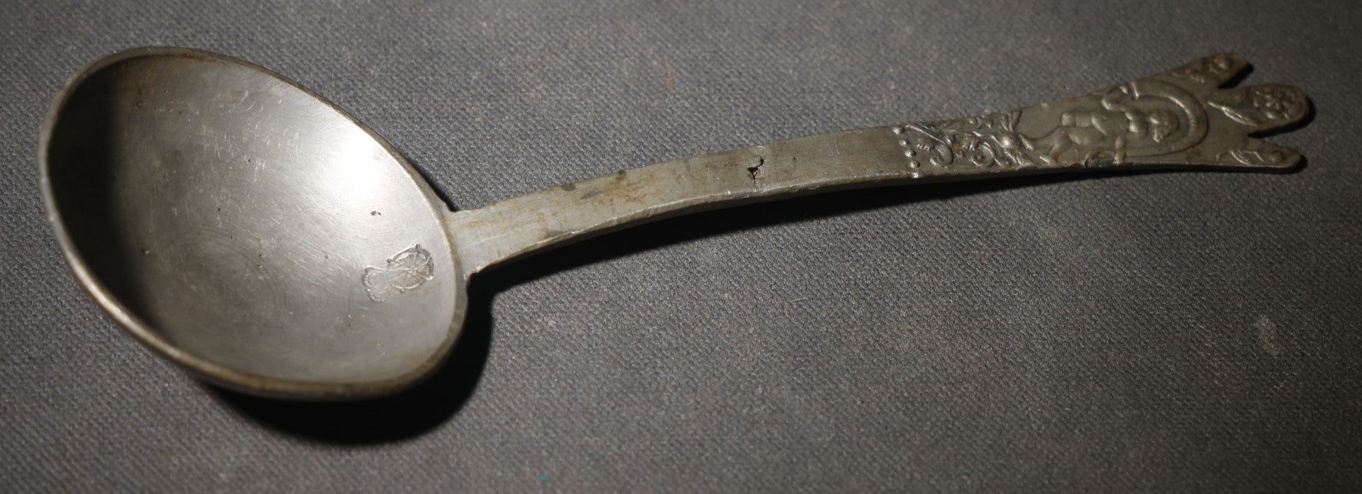 Antique Pewter Spoon with Figural Cherub Handle and Stamped Rose Mark in Bowl