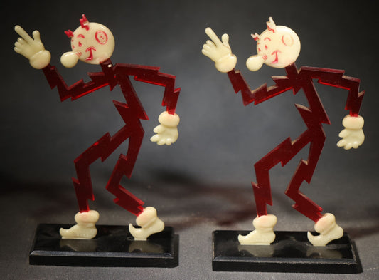 Pair of Vintage Reddy Kilowatt Figural Display Advertising Pieces, Red Lightning Bolt Body with Cream Head, Hands, and Feet on Black Base, Circa 1950s-1960s