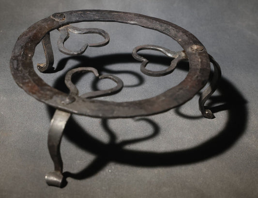 Antique Wrought Iron Footed Trivet with Heart-Shaped Scrollwork Design
