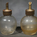 Lot 059 - Pair of Vintage Lunkenheimer Glass Oiler Bottles with Brass Spouts, 4-1/4" H each