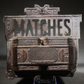 Lot 062 - Antique Tin Wall-Mount Match Holder with Pierced "Matches" Text, "Burnt" And "Good" Compartments, and "Safety" Striking Surface, 4-5/8" H
