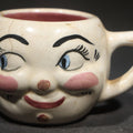 Lot 079 - Vintage Handmade Ceramic Face Mug Gift for "Maria" With "All Gone" Interior, Handmade by M. Riley, Hanover, Pennsylvania, 1927, Chipped, Broken, and Repaired, 2-1/2" H