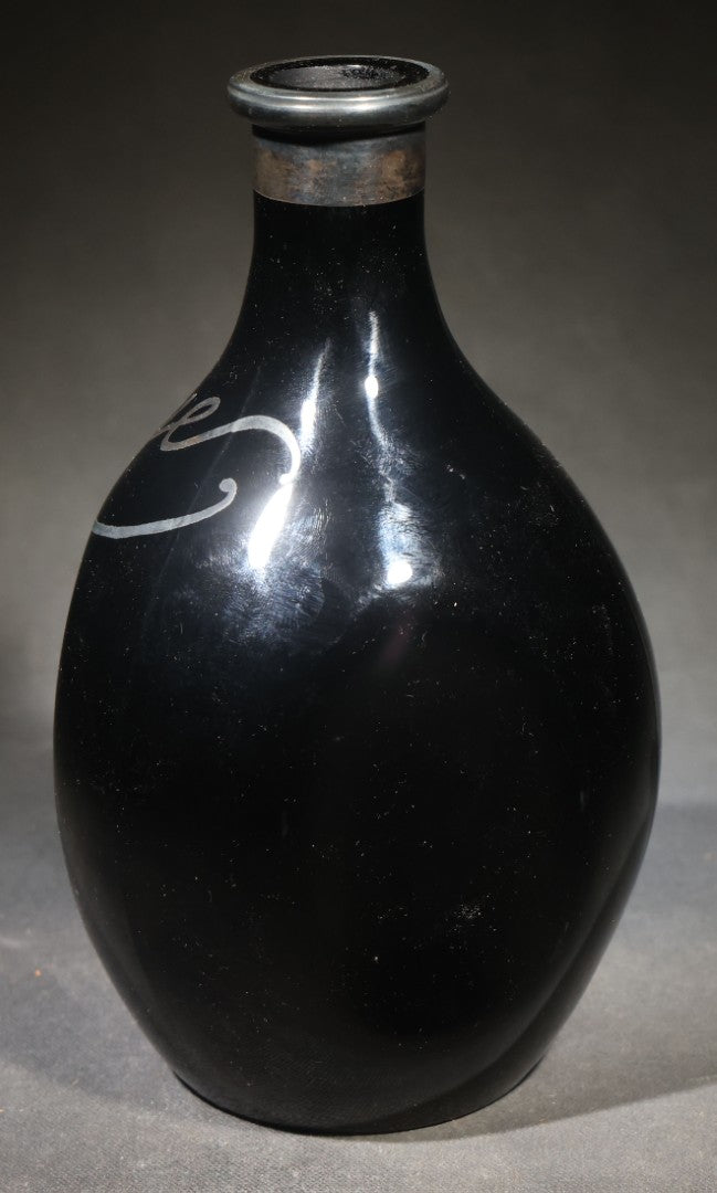 Antique Black Glass "Rye" Back Bar Bottle with Silver Overlay Script Lettering, Pinched Body, and Metal Collar
