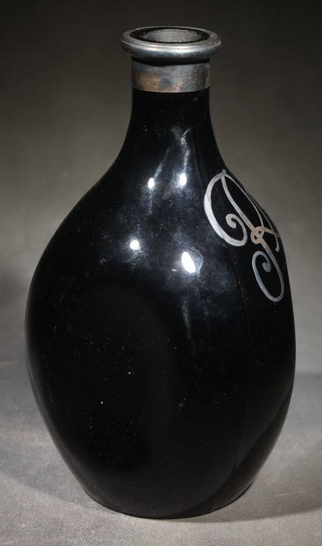 Antique Black Glass "Rye" Back Bar Bottle with Silver Overlay Script Lettering, Pinched Body, and Metal Collar