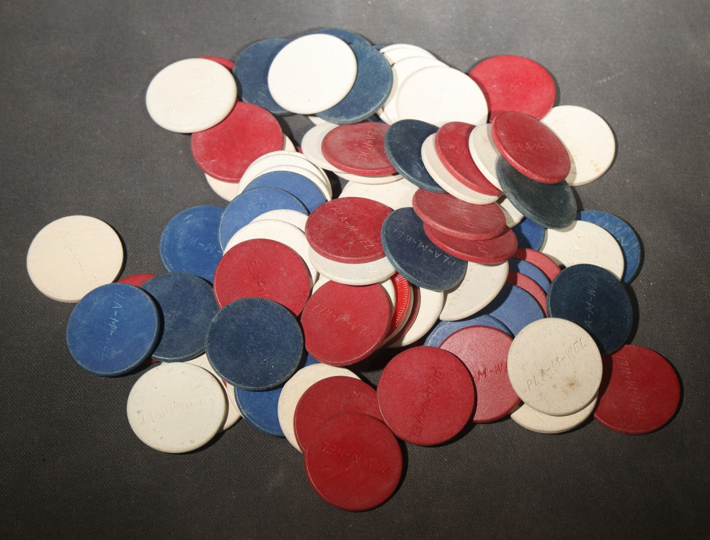 Vintage Grouping of Pla-M-Wel Clay Poker Chips in Red, White, and Blue