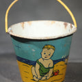 Lot 090 - Vintage Tin Lithograph Toy Sand Pail with Beach Scene of Children Playing in Sand, Wire Bail Handle, 3-1/2" H
