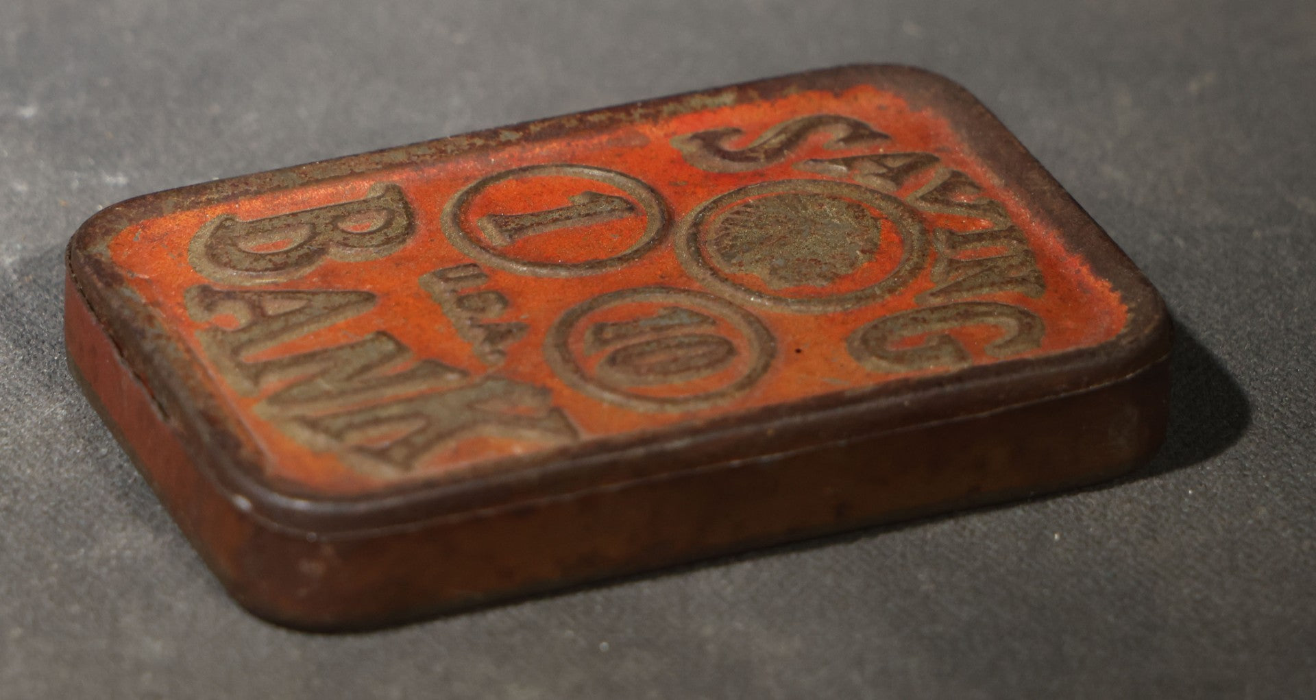 Antique Pressed Tin "Saving Bank" Still Bank with Indian Head Penny, "1," and "10" Coin Graphics, Marked U.S.A.