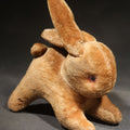 Lot 101 - Vintage Stuffed Rabbit Toy with Glass Eyes and Cotton Tail in Crouching Pose, 4-1/8" L