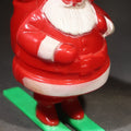 Lot 102 - Vintage Plastic Christmas Santa Claus on Skis Candy Container, Circa 1950s, Manufactured by Rosbro Plastics, Pawtucket, Rhode Island, 4-1/2" H