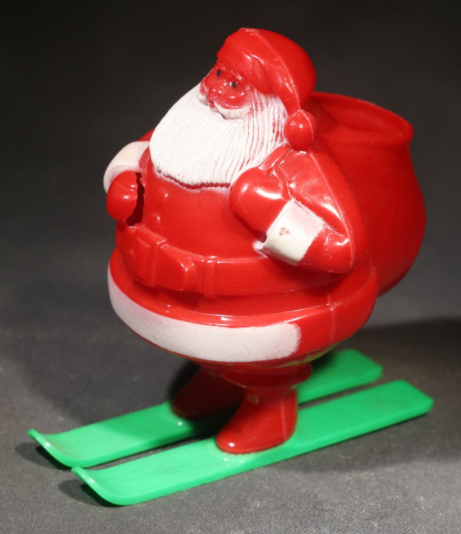 Vintage Plastic Christmas Santa Claus on Skis Candy Container, Circa 1950s, Manufactured by Rosbro Plastics, Pawtucket, Rhode Island