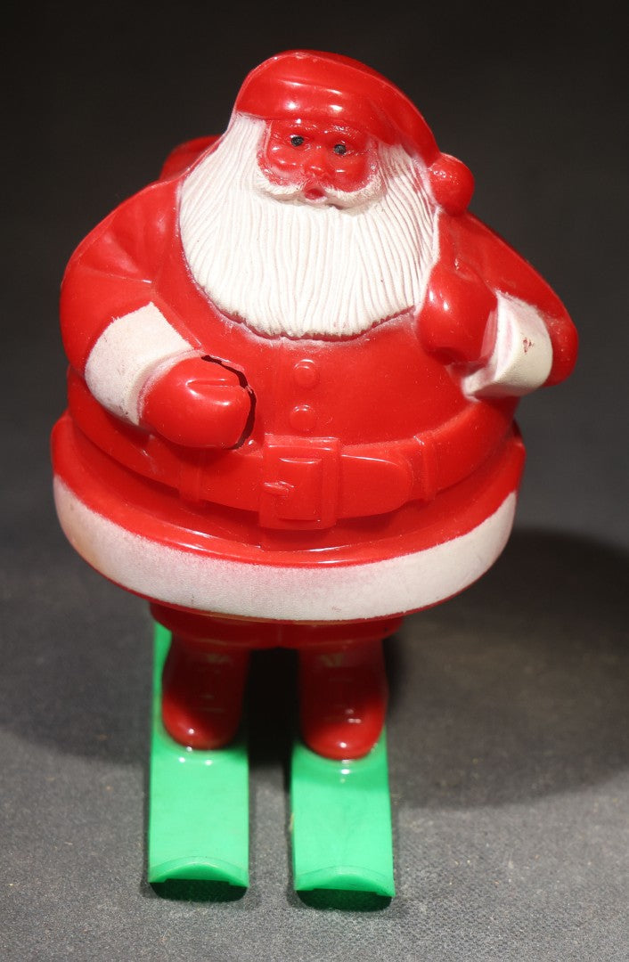 Vintage Plastic Christmas Santa Claus on Skis Candy Container, Circa 1950s, Manufactured by Rosbro Plastics, Pawtucket, Rhode Island