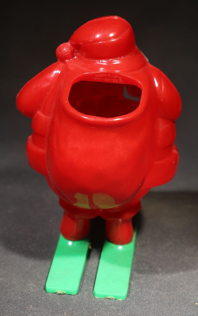 Vintage Plastic Christmas Santa Claus on Skis Candy Container, Circa 1950s, Manufactured by Rosbro Plastics, Pawtucket, Rhode Island