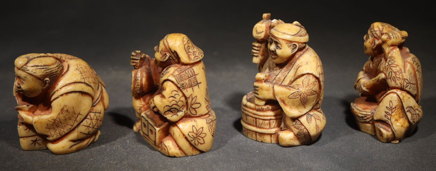 Grouping of Four Vintage Cast Resin Netsuke-Style Figurines, Seated Japanese Figures with Pipe, Gourd, Drum, and Drawers