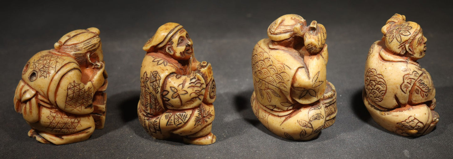 Grouping of Four Vintage Cast Resin Netsuke-Style Figurines, Seated Japanese Figures with Pipe, Gourd, Drum, and Drawers