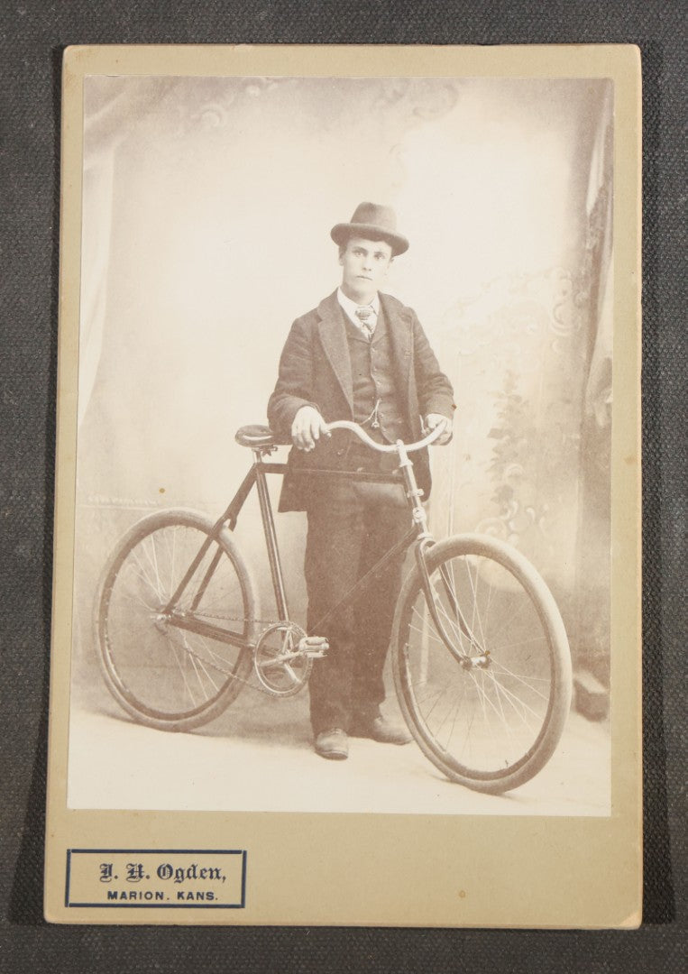 Antique Cabinet Card Photograph of a Young Man with a Safety Bicycle, Photographed by J.H. Ogden, Marion, Kansas