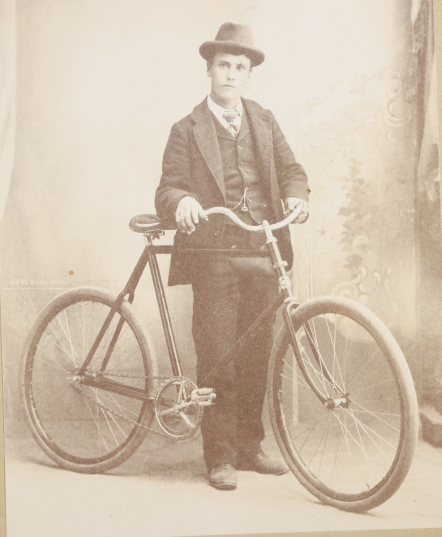 Antique Cabinet Card Photograph of a Young Man with a Safety Bicycle, Photographed by J.H. Ogden, Marion, Kansas