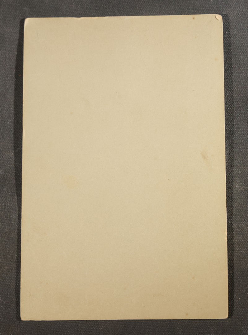 Antique Cabinet Card Photograph of a Young Man with a Safety Bicycle, Photographed by J.H. Ogden, Marion, Kansas