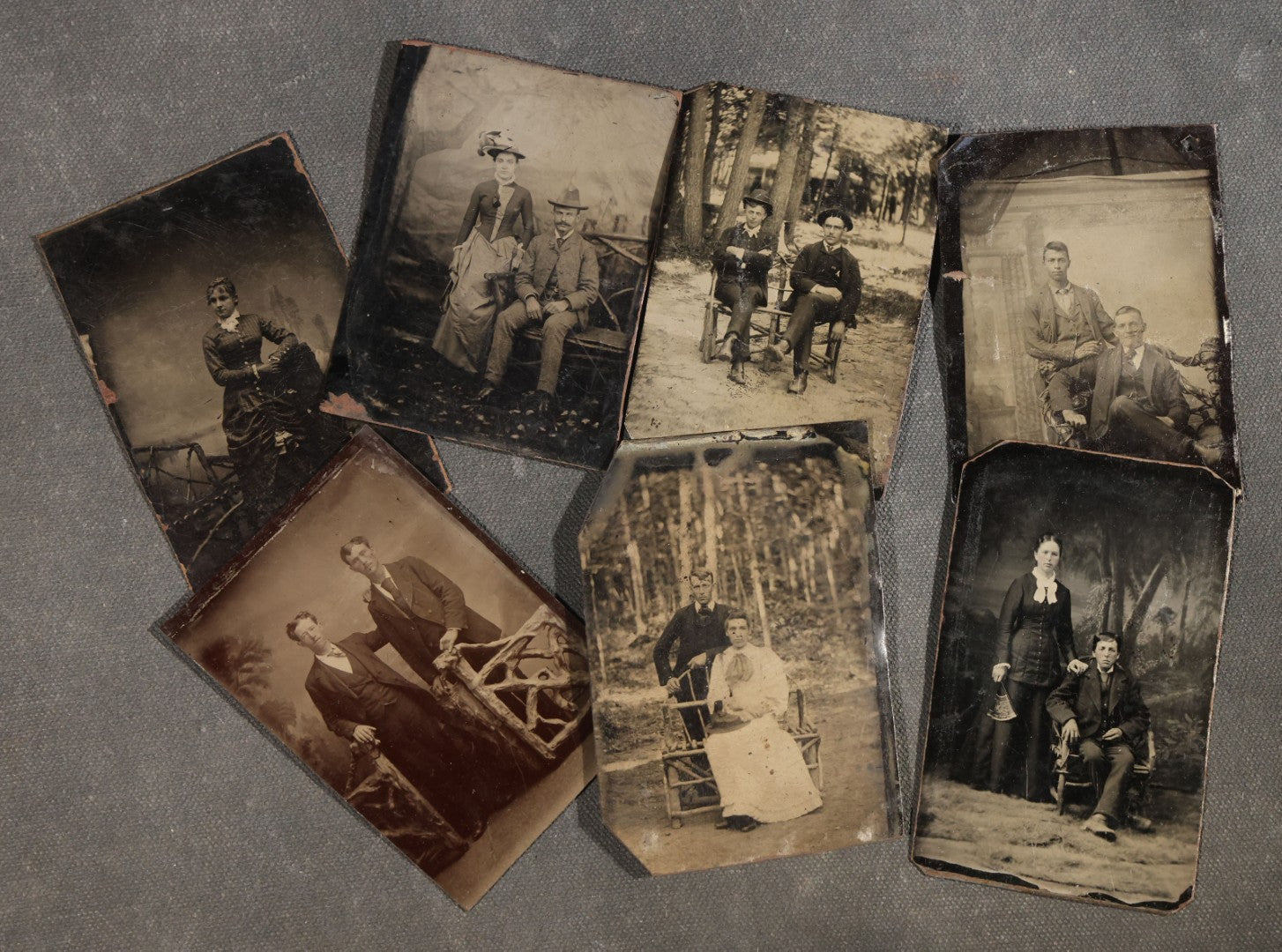 Grouping of Seven Antique Tintype Photographs with Rustic Adirondack-Style Branch Furniture including Outdoor Portraits and Couples Posed with Twig Chairs and Benches