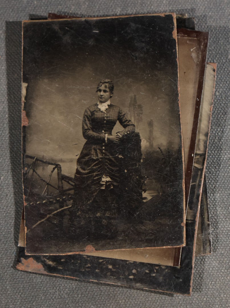 Grouping of Seven Antique Tintype Photographs with Rustic Adirondack-Style Branch Furniture including Outdoor Portraits and Couples Posed with Twig Chairs and Benches