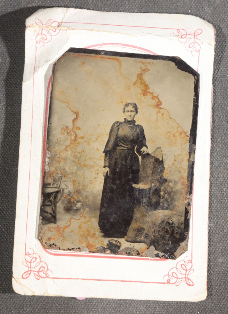 Grouping of 15 Antique Tintype Photographs including Man in Top Hat with Cane, Group of Women in White Dresses and Hats, Seated Couples, and Paper-Matted Portrait of a Seated Woman