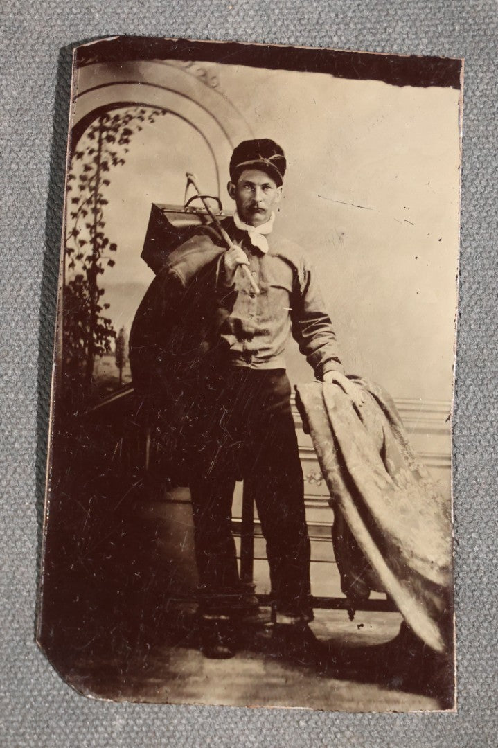 Grouping of 11 Antique Tintype Photographs, Portraits of Men, Women, Children, Couples, and Family Groups