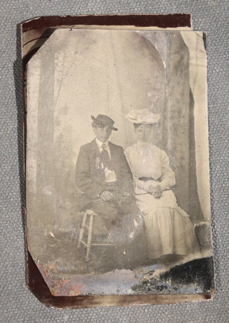 Grouping of 11 Antique Tintype Photographs, Portraits of Men, Women, Children, Couples, and Family Groups