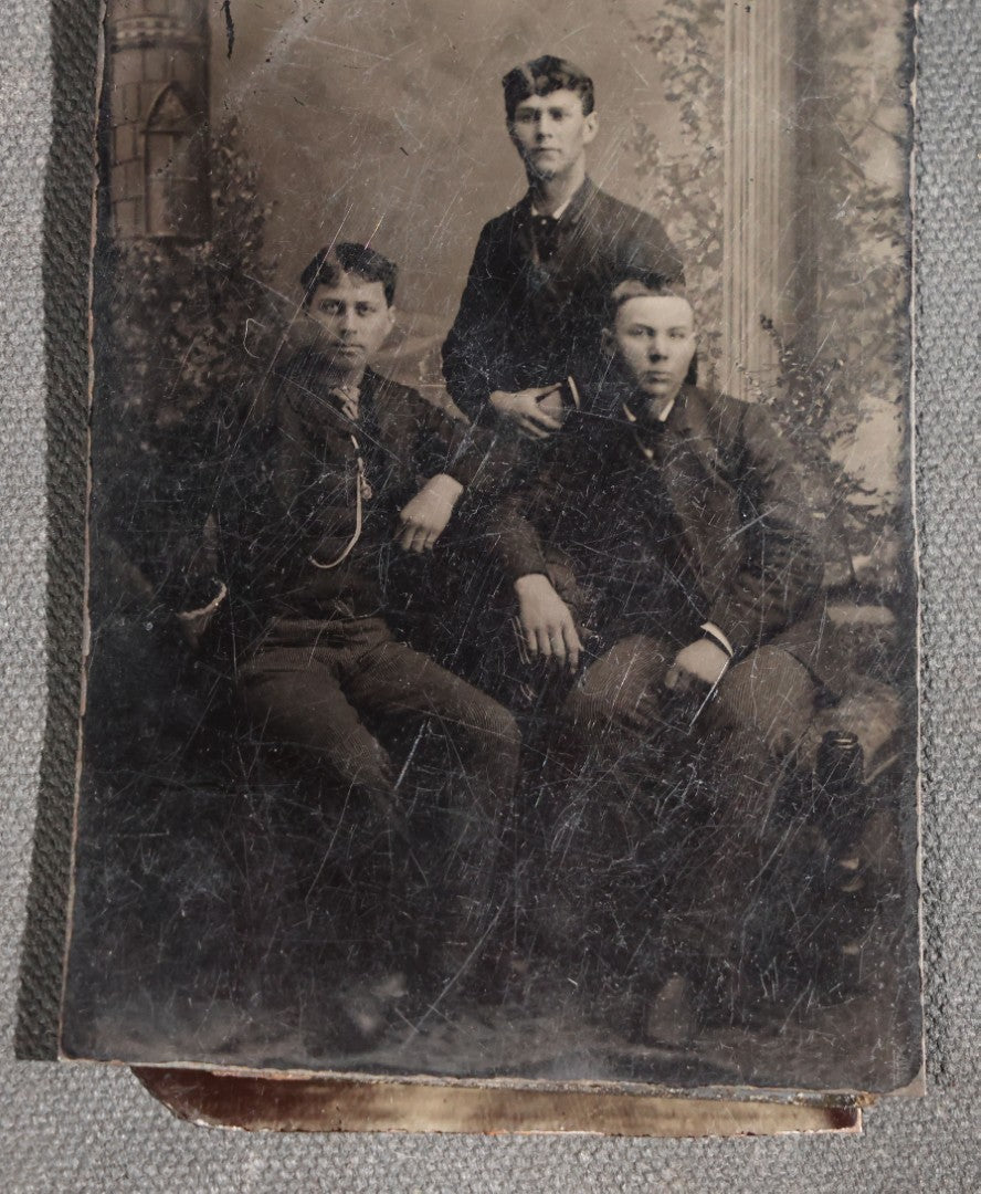 Grouping of 11 Antique Tintype Photographs, Portraits of Men, Women, Children, Couples, and Family Groups