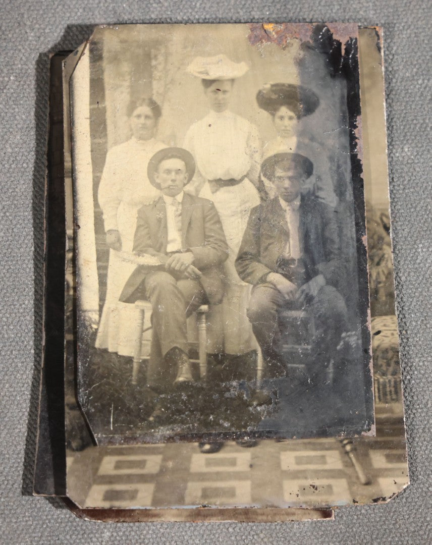 Grouping of 11 Antique Tintype Photographs, Portraits of Men, Women, Children, Couples, and Family Groups