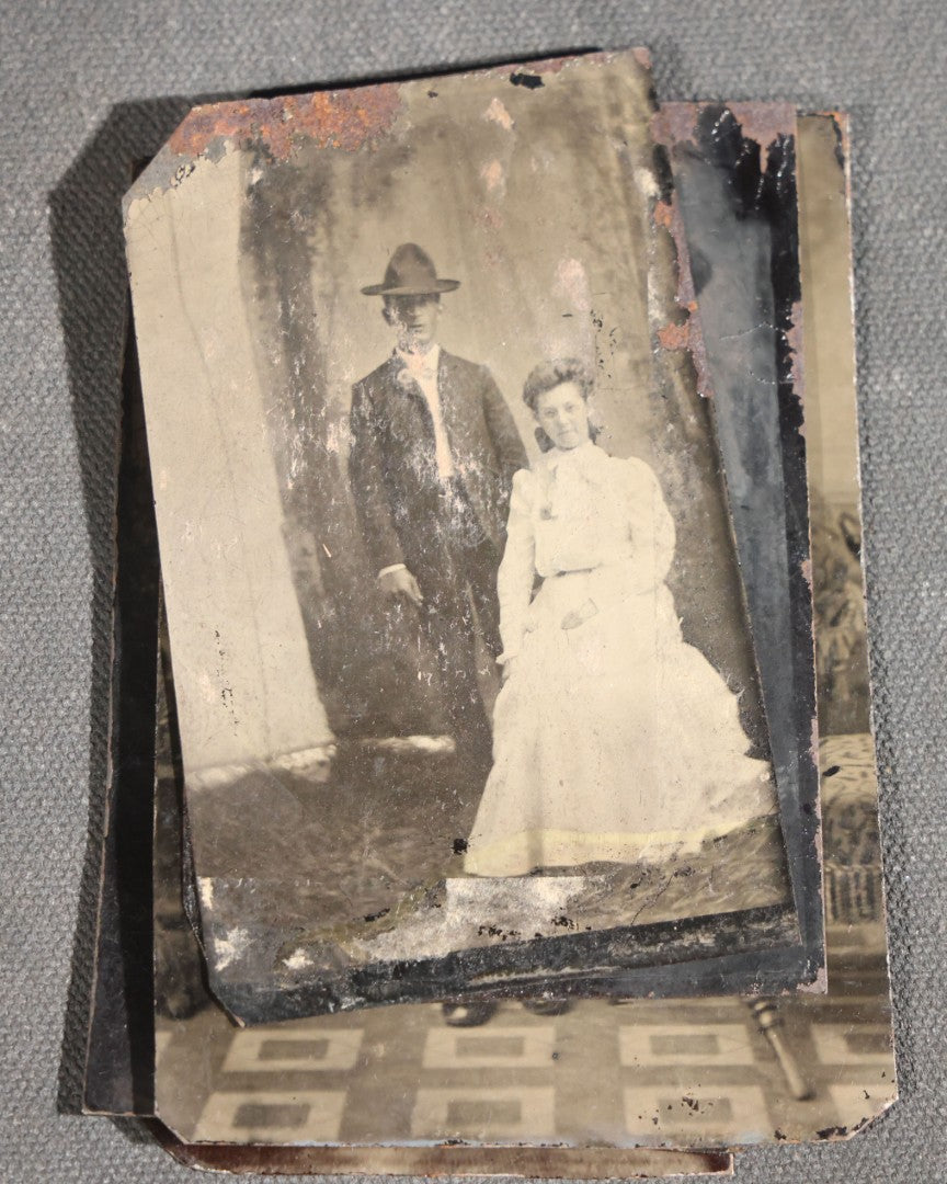 Grouping of 11 Antique Tintype Photographs, Portraits of Men, Women, Children, Couples, and Family Groups
