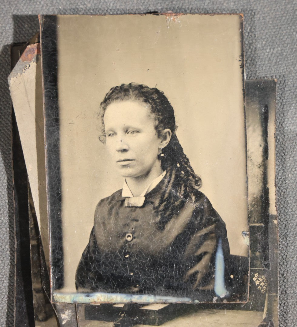 Grouping of 11 Antique Tintype Photographs, Portraits of Men, Women, Children, Couples, and Family Groups