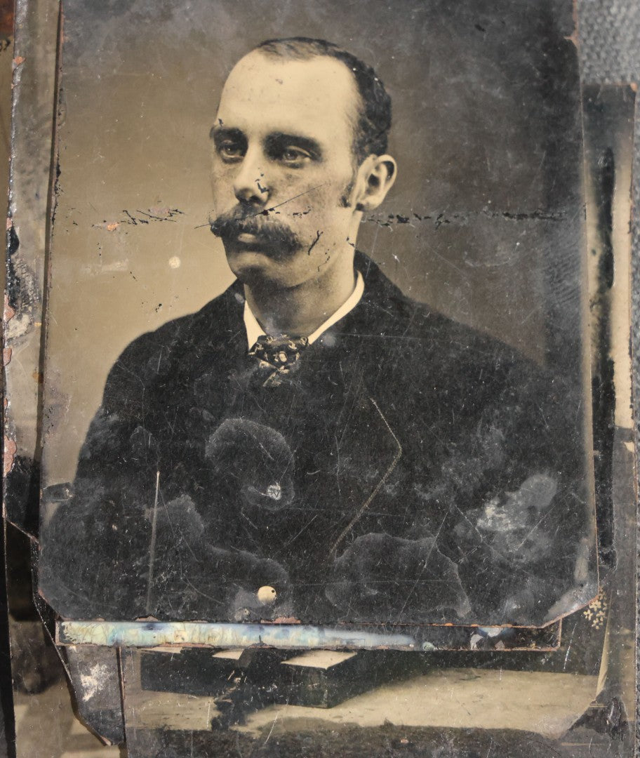 Grouping of 11 Antique Tintype Photographs, Portraits of Men, Women, Children, Couples, and Family Groups