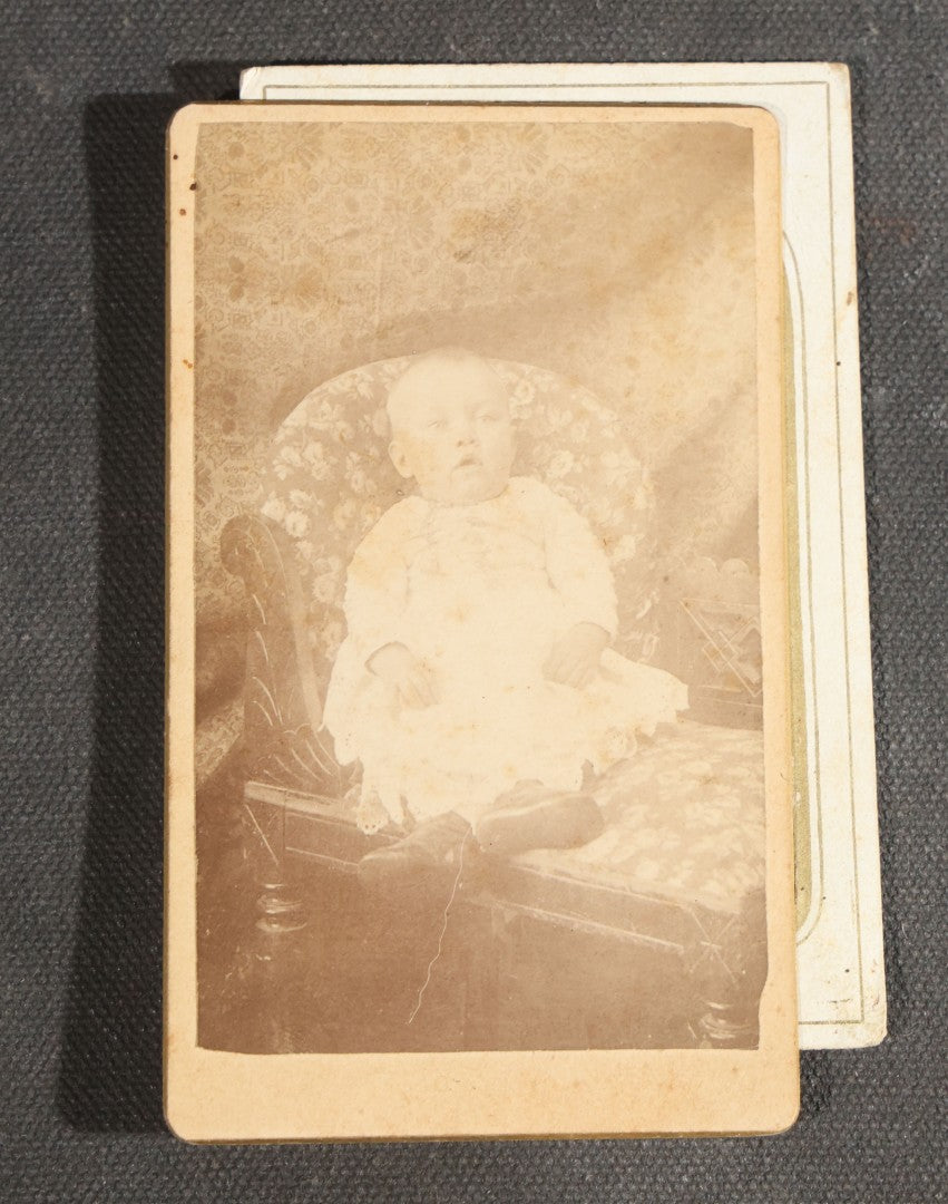 Grouping of Nine Antique Photographs including Two Tintype Photographs and Seven Carte de Visite C.D.V. Portraits, Babies, Children, Young Men, and Young Woman, One by Dunlap, Chillicothe, Missouri