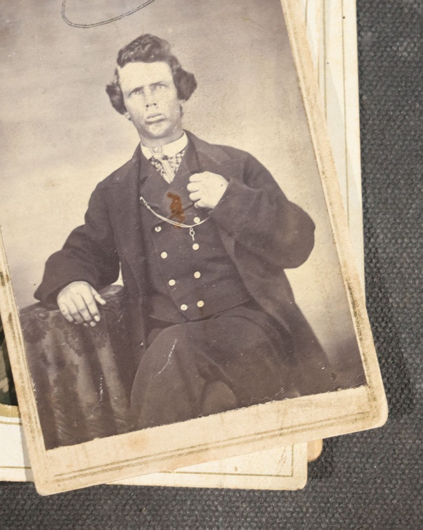 Grouping of Nine Antique Photographs including Two Tintype Photographs and Seven Carte de Visite C.D.V. Portraits, Babies, Children, Young Men, and Young Woman, One by Dunlap, Chillicothe, Missouri