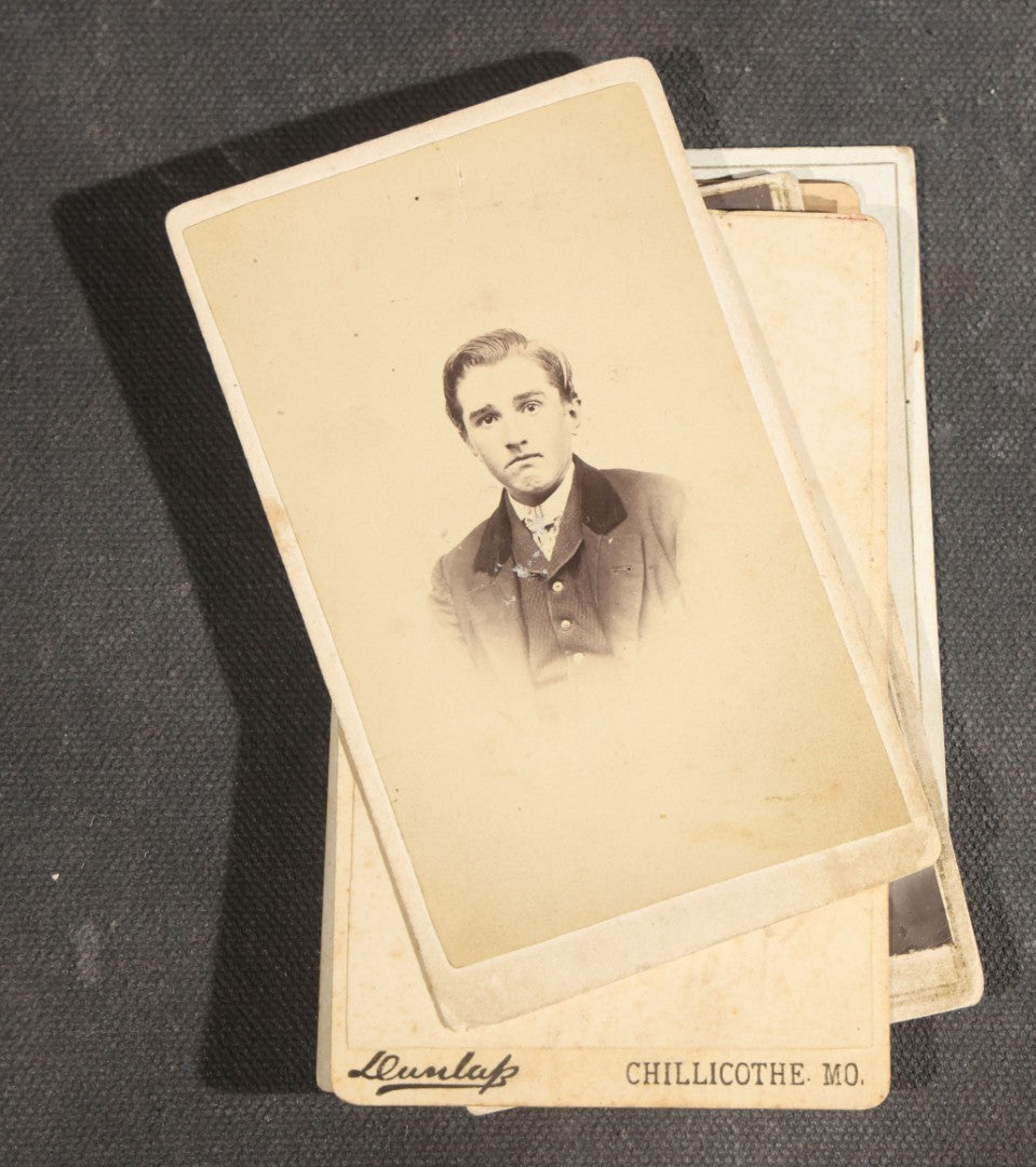 Grouping of Nine Antique Photographs including Two Tintype Photographs and Seven Carte de Visite C.D.V. Portraits, Babies, Children, Young Men, and Young Woman, One by Dunlap, Chillicothe, Missouri