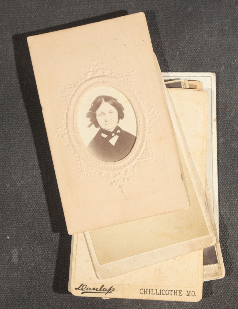 Grouping of Nine Antique Photographs including Two Tintype Photographs and Seven Carte de Visite C.D.V. Portraits, Babies, Children, Young Men, and Young Woman, One by Dunlap, Chillicothe, Missouri